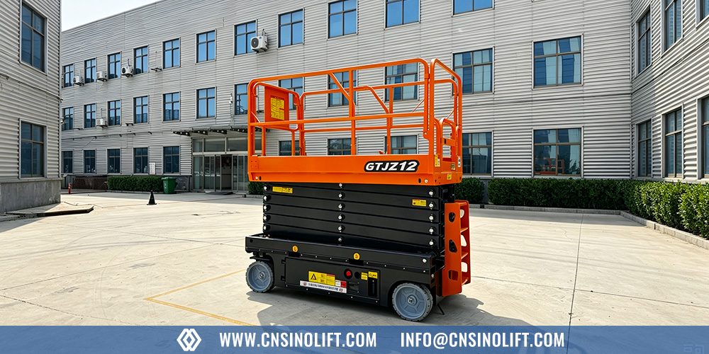 Self-propelled scissor lift working on a job site